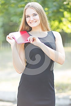 Happy smiling lady reading book