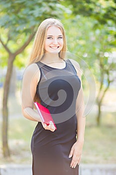 Happy smiling lady reading book