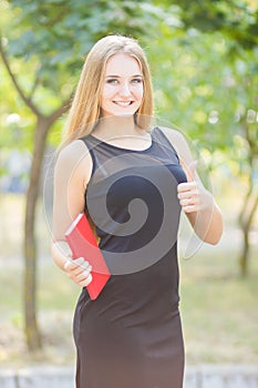 Happy smiling lady reading book