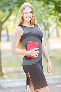 Happy smiling lady reading book