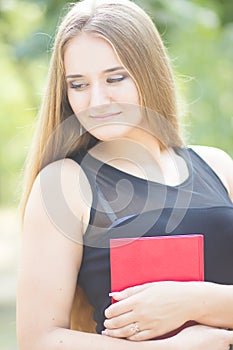 Happy smiling lady reading book