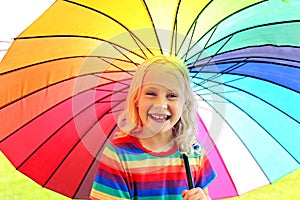 Happy Smiling Little Girl Child Holding Rainbow Umbrella