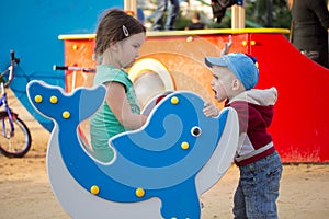 Happy smiling little girl on playground