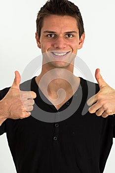 Happy smiling man doing two thumbs up