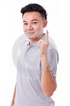 Happy, smiling man giving no.1 hand gesture