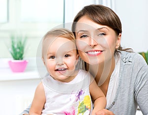 Happy Smiling Mother and Baby