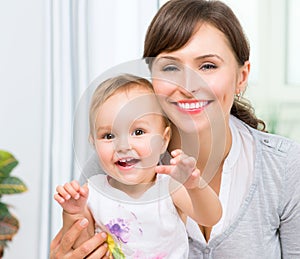 Happy Smiling Mother and Baby