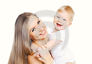 Happy smiling mother and baby having fun together on white