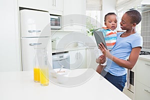 Happy smiling mother with his babyboy