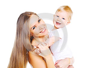 Happy smiling mother playing with baby on a white background