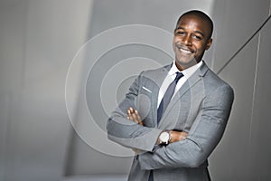 Happy smiling portrait of a successful confident african american corporate executive business man