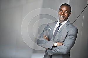 Happy smiling portrait of a successful confident african american corporate executive business man photo
