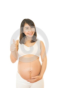 Happy smiling pregnant woman showing like gesture isolated on white background