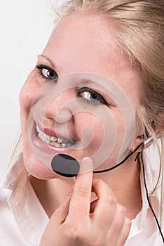 Happy, smiling professional woman with headset