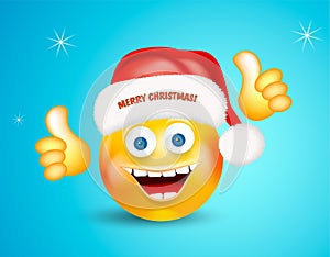 Happy smiling round face wearing a red santa claus hat with lettering merry christmas showing thumbs up on bright blue background.