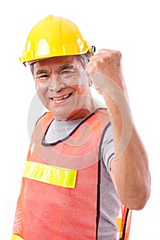 Happy, smiling senior construction worker or engineer