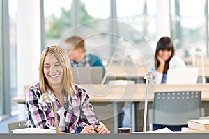 Happy smiling student study in classroom