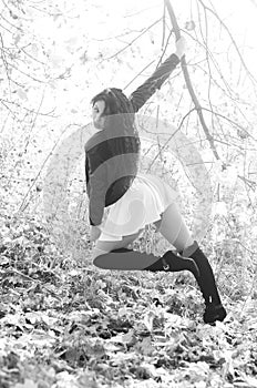 Happy smiling teen girl outdoors portrait. Black and white photo