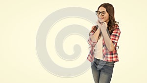 Happy smiling teenage girl teenager wearing photobooth party glasses celebrating party entertaining