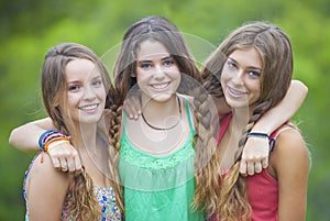 Happy smiling teenage girls with white teeth