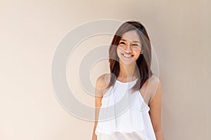 Happy smiling woman in casual dress, warm tone color