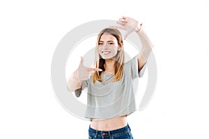 Happy smiling woman framing her face with her hands