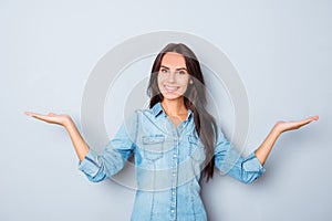 Happy smiling woman gesturing with hands and showing balance