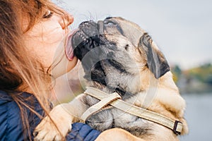 Happy smiling woman and her dog. Portrait of a girl and pet