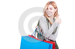 Happy smiling woman with shopping bags