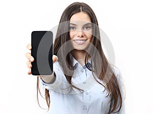 Happy smiling woman showing mobile phone isolated in white