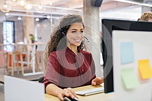 Happy smiling woman working in call center