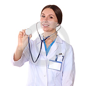 Happy smiling young beautiful female doctor showing blank area for sign or copyspace, isolated over white background