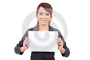 Happy smiling young business woman holding blank signboard,