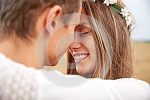 Happy smiling young hippie couple outdoors