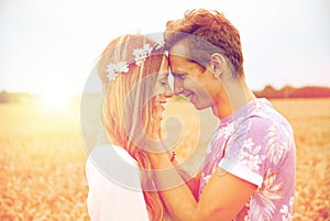 Happy smiling young hippie couple outdoors