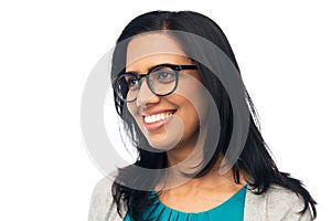 Happy smiling young indian woman in glasses