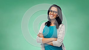 Happy smiling young indian woman in glasses