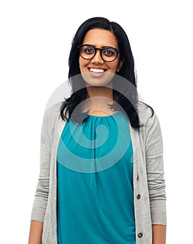 Happy smiling young indian woman in glasses