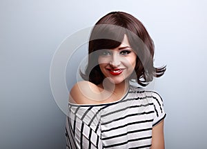 Happy smiling young woman with short black hair style