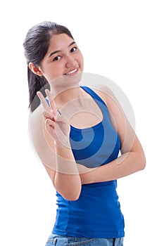 Happy smiling young woman showing two fingers