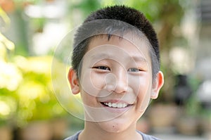 Happy smily face Asian girl with bokeh