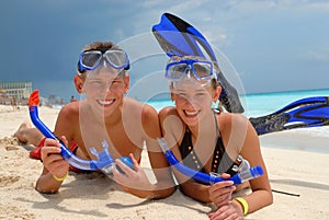 Happy snorkeling teenagers