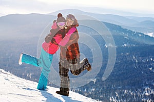 Happy snowboarding couple