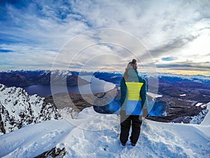 Happy snowboarding girl, Remarkables, New Zealand