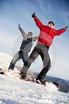 Happy snowboarding team