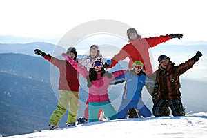 Happy snowboarding team