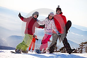 Happy snowboarding team