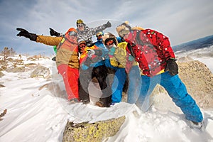 Happy snowboarding team