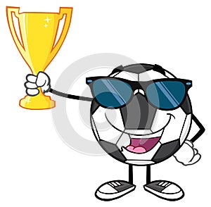 Happy Soccer Ball Cartoon Character With Sunglasses Holding A Golden Trophy Cup