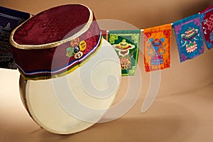 Happy Sonam Losar lunar New Year festival of Nepal. Traditional Tamang topi hat and hand drum for celebrating.